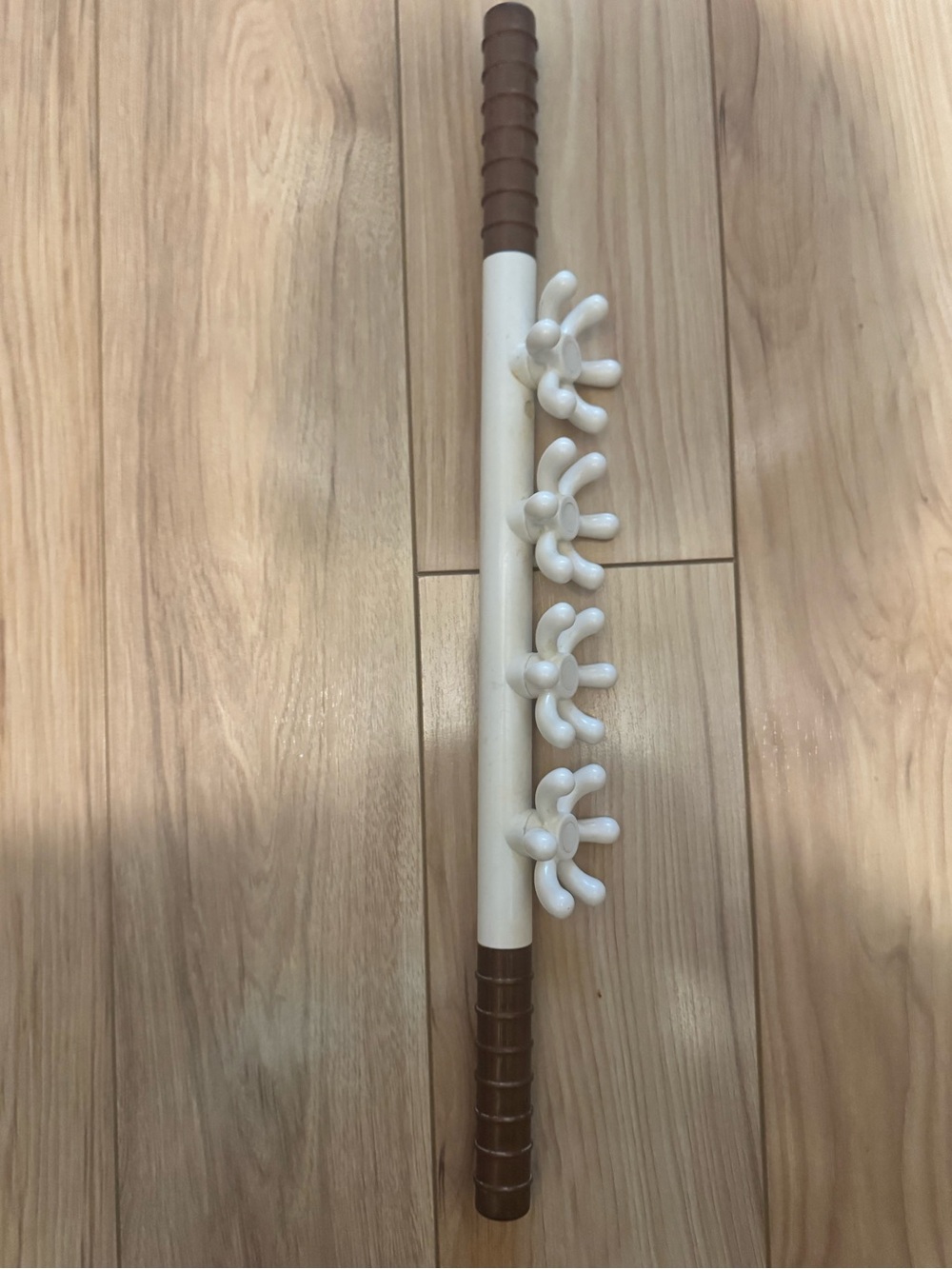 White and Brown Handheld Massage Stick with Rolling Nodes